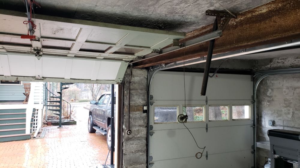 Garage Door Repair or Buy New: What's better?